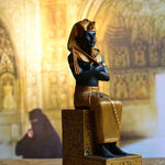 Black and gold pharaoh statue